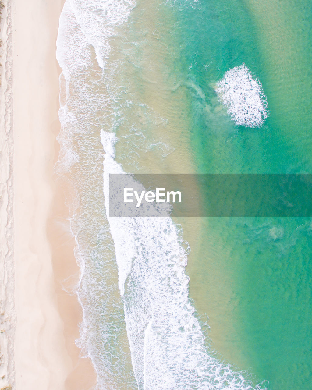 Aerial view of beach and waves 