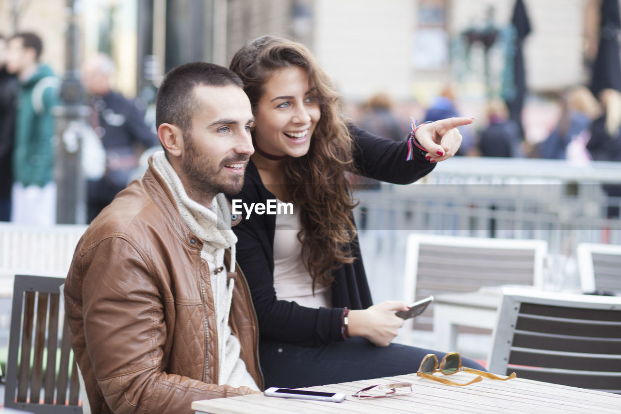 Portrait of happy young couple