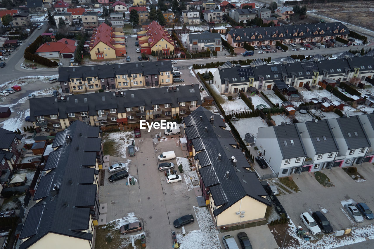 Aerial drone view of residential neighborhood in winter season