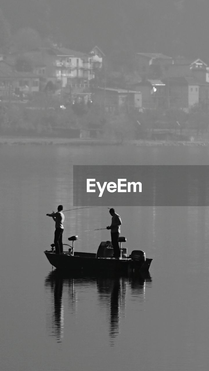 MEN ON BOAT