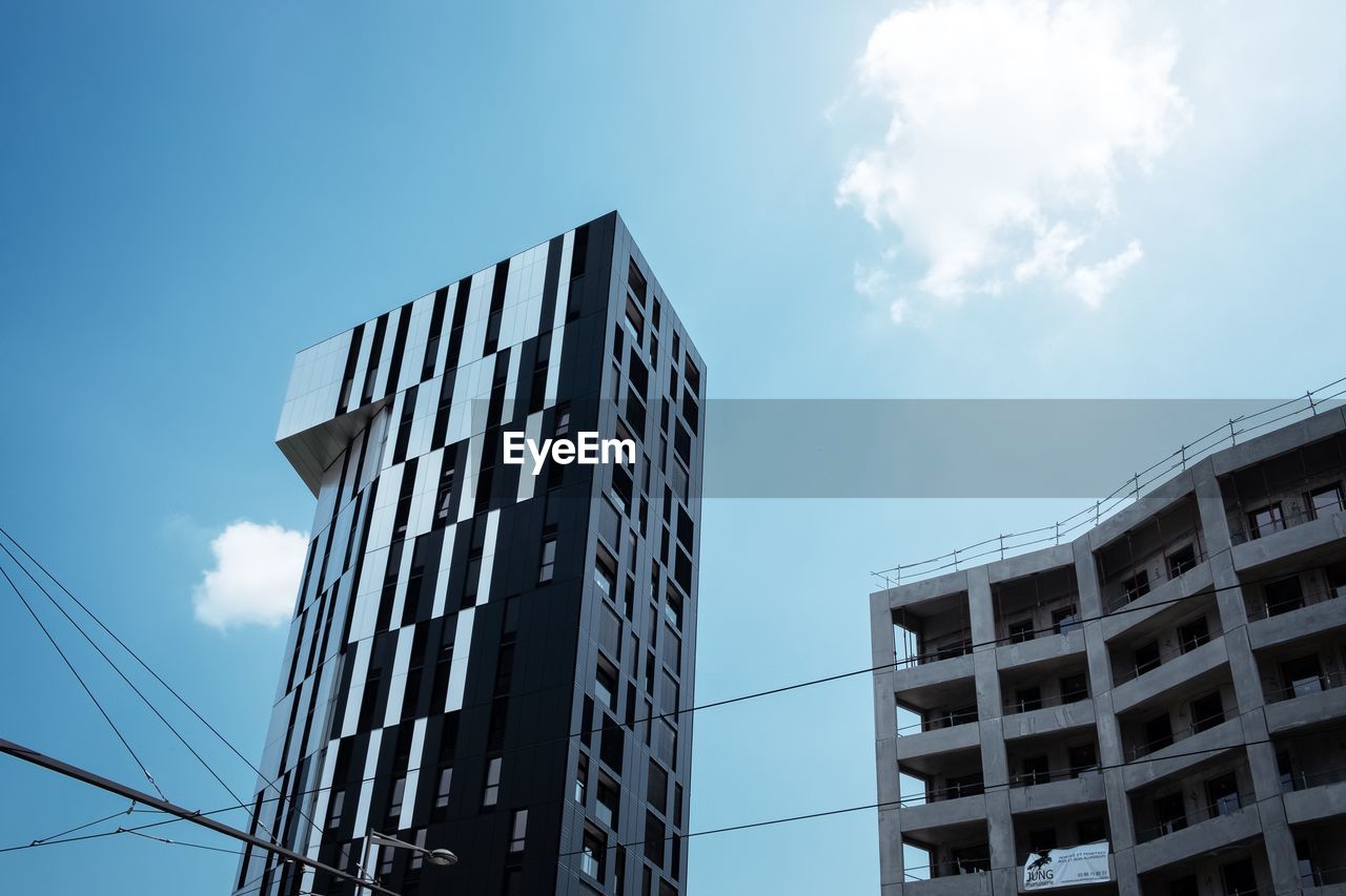 Low angle view of modern building against sky