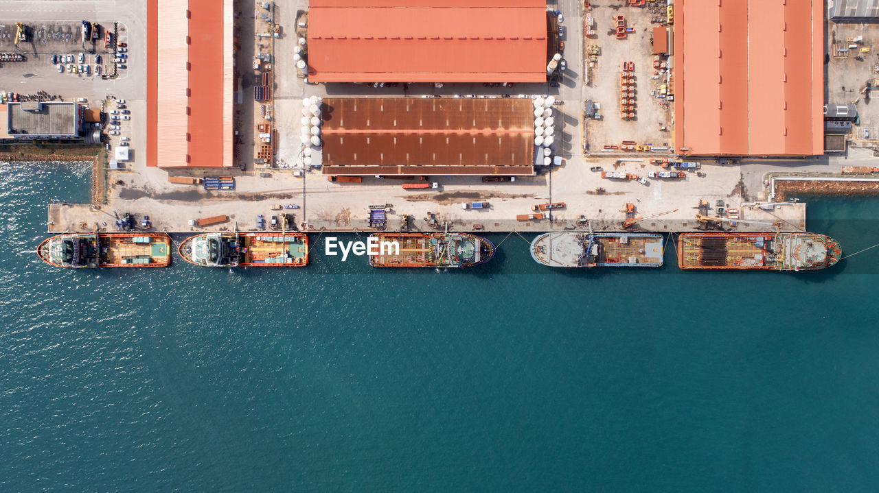 High angle view of commercial dock by sea