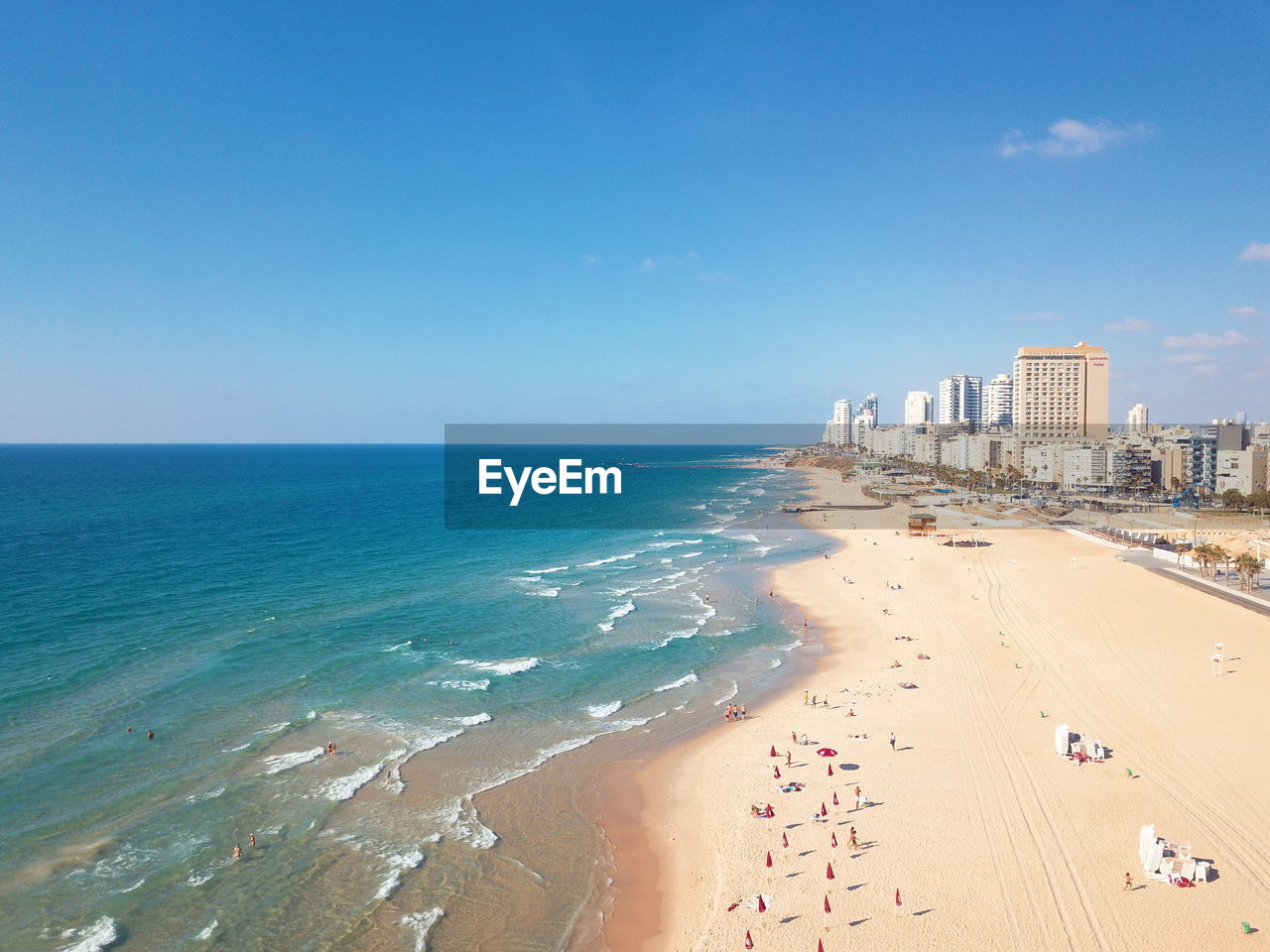 Scenic view of sea against blue sky