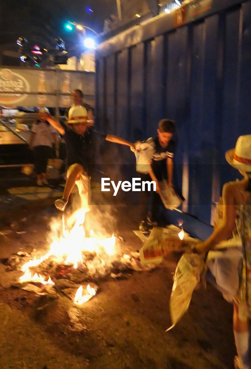 GROUP OF PEOPLE IN FIRE