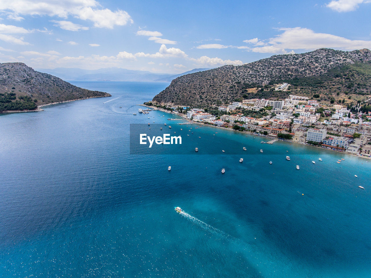 High angle view of sea and shore against sky