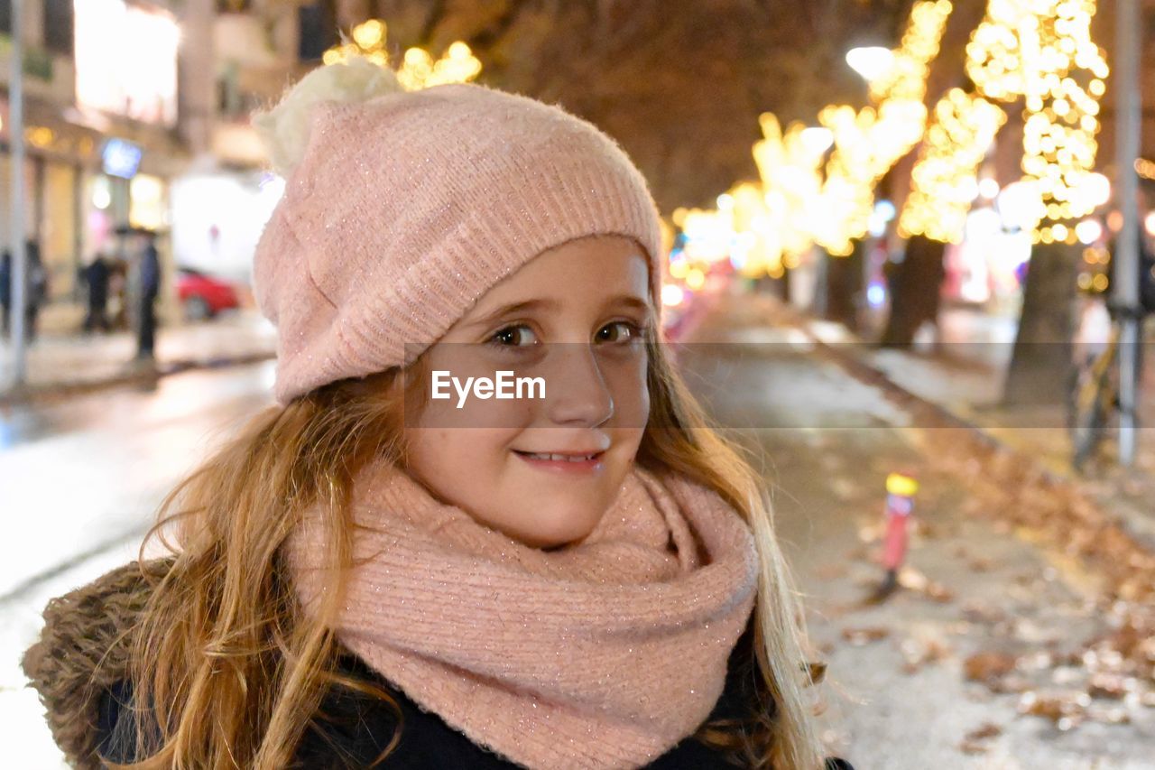 Portrait of a smiling young girl in winter