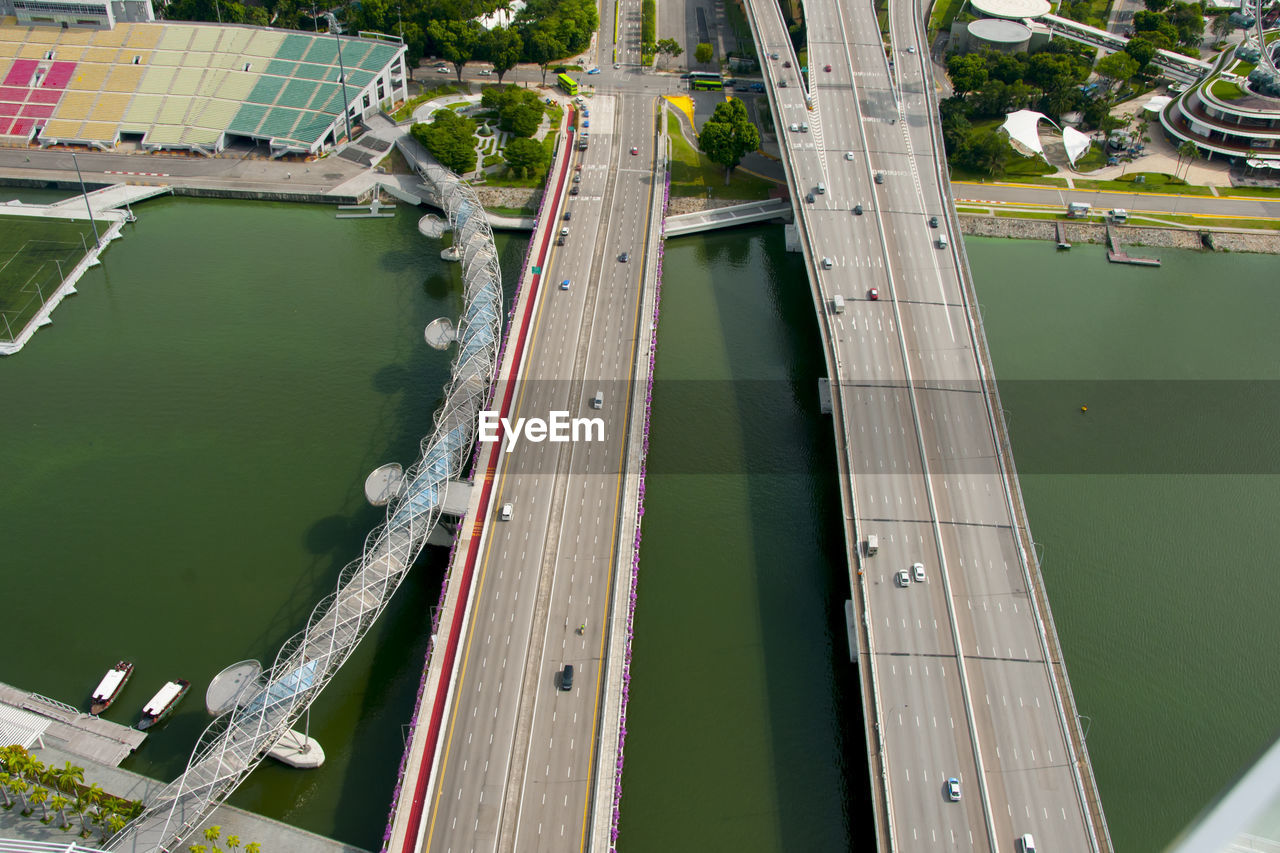 HIGH ANGLE VIEW OF BRIDGE OVER RIVER