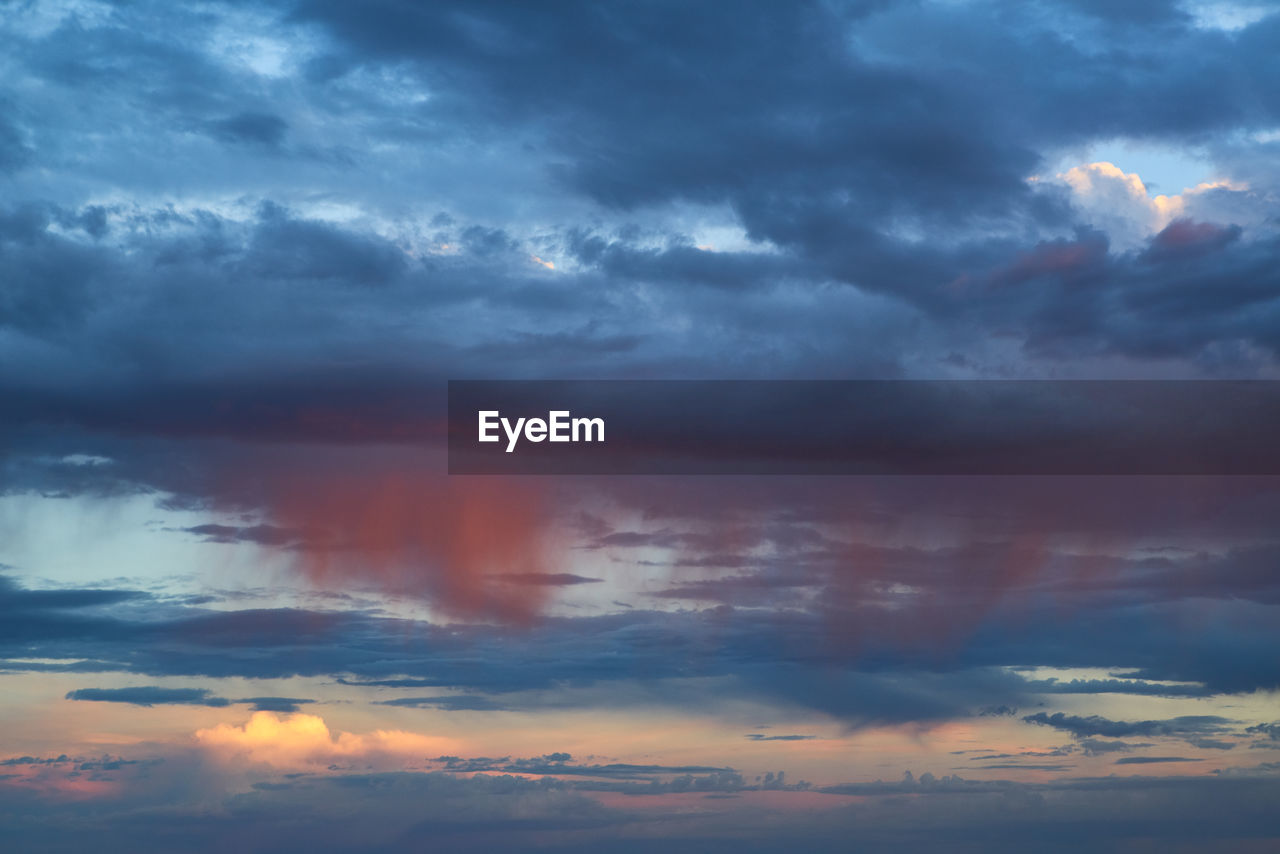 LOW ANGLE VIEW OF CLOUDY SKY DURING SUNSET