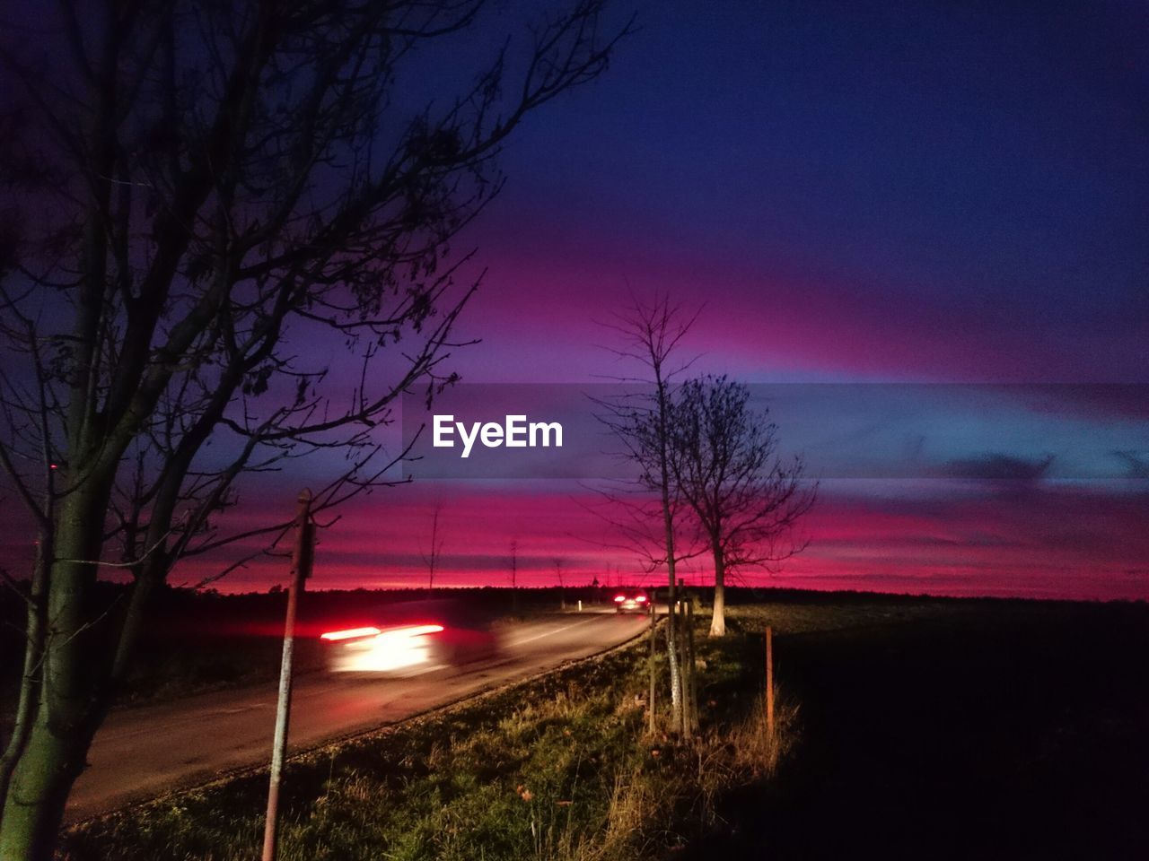 EMPTY ROAD AT SUNSET