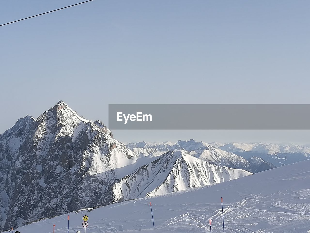 SNOWCAPPED MOUNTAINS AGAINST CLEAR SKY