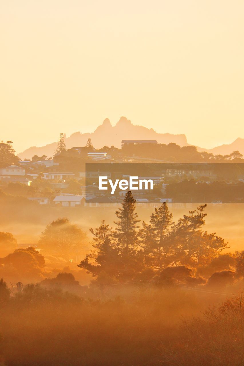 Scenic view of mountains against sky during sunset