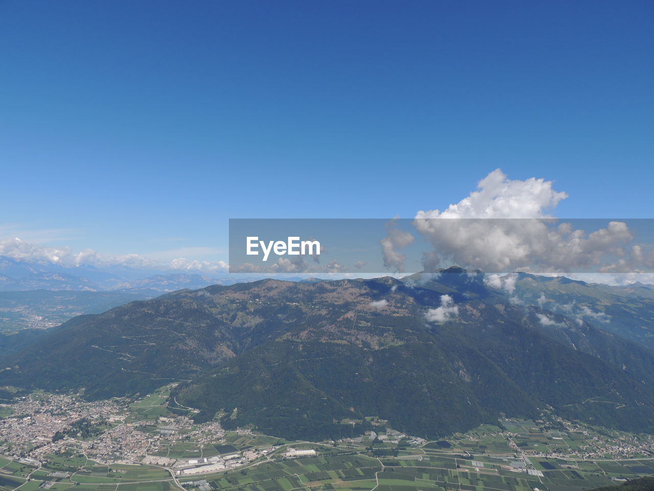 SCENIC VIEW OF LANDSCAPE AGAINST BLUE SKY