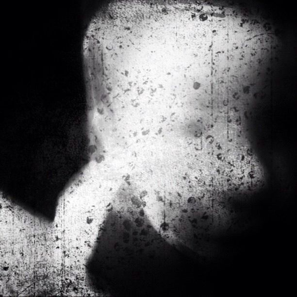 shadow, indoors, close-up, one person, black background, day, people