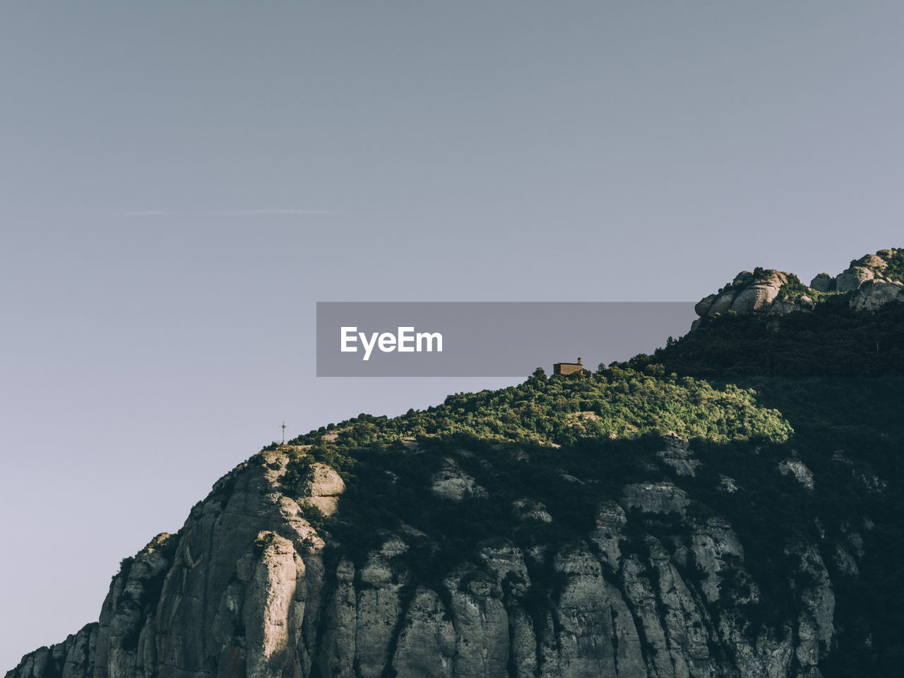 Low angle view of rock formations against clear sky