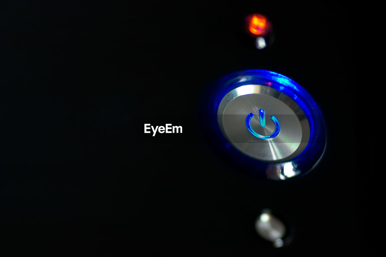 Close-up of illuminated button