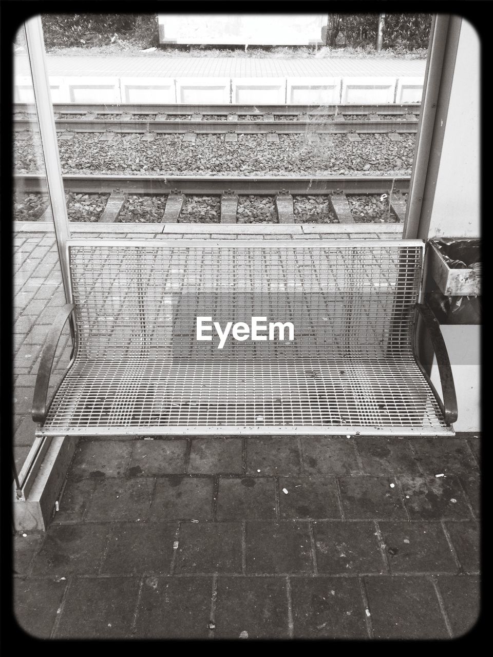 Empty bench on railroad station