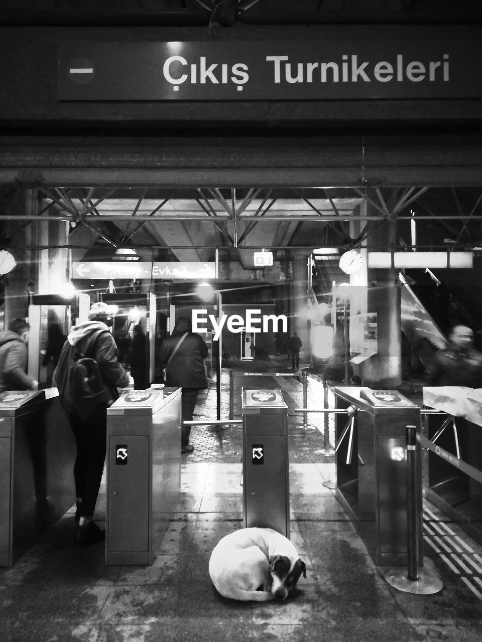 GROUP OF PEOPLE WAITING FOR TRAIN