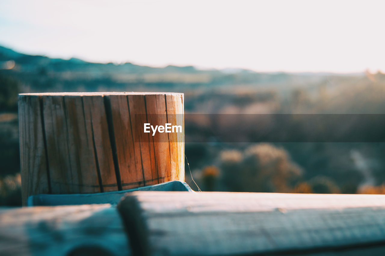 Close-up of wooden fence against sky