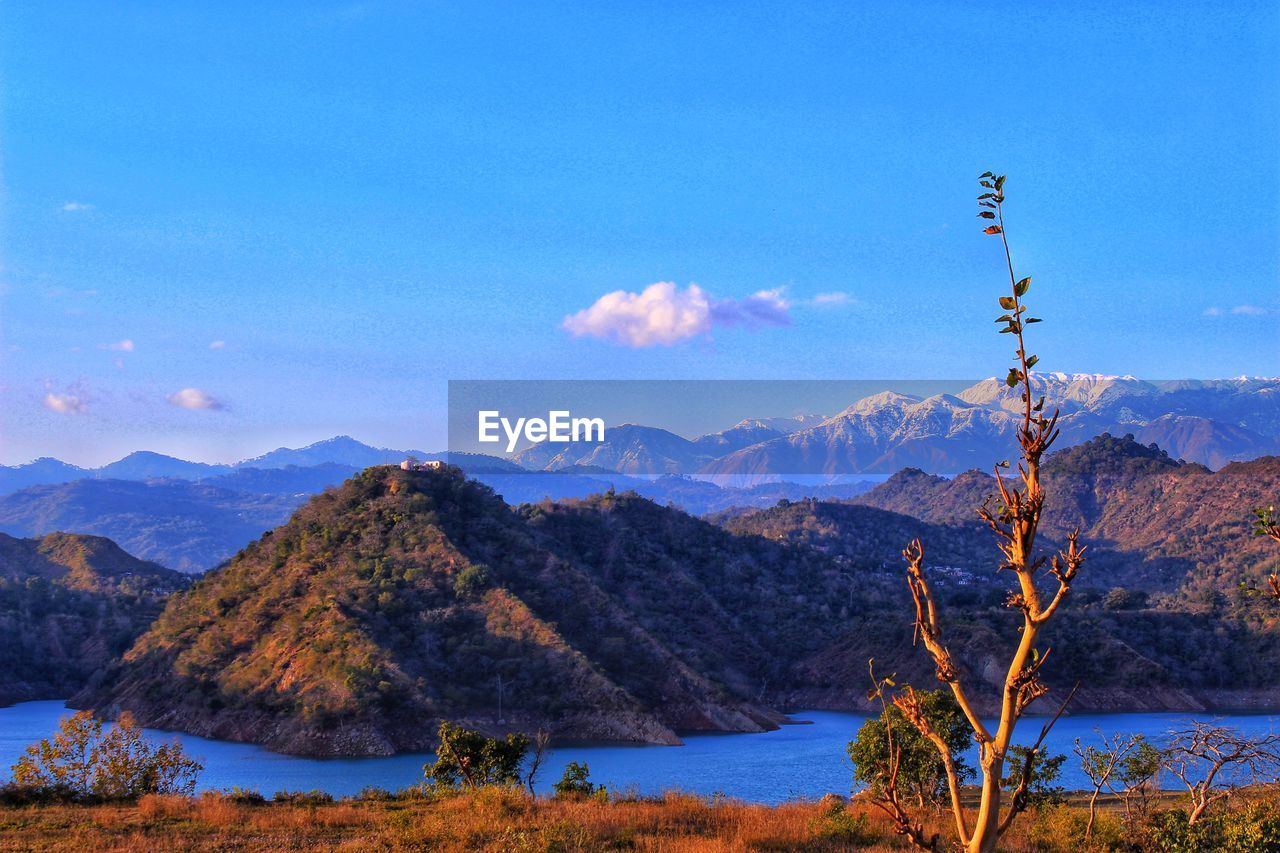 Scenic view of mountains against sky