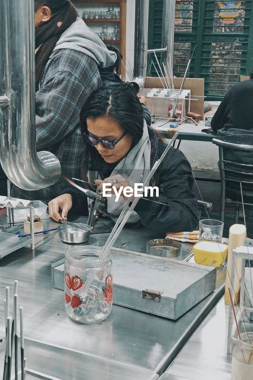 Man and woman working on table