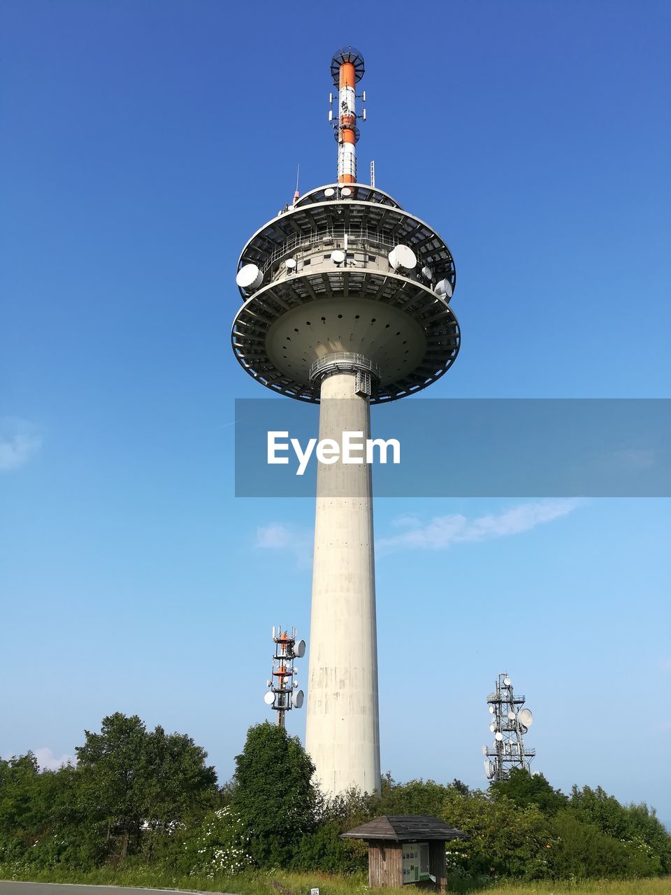 LOW ANGLE VIEW OF LIGHTHOUSE ON BUILDING AGAINST SKY