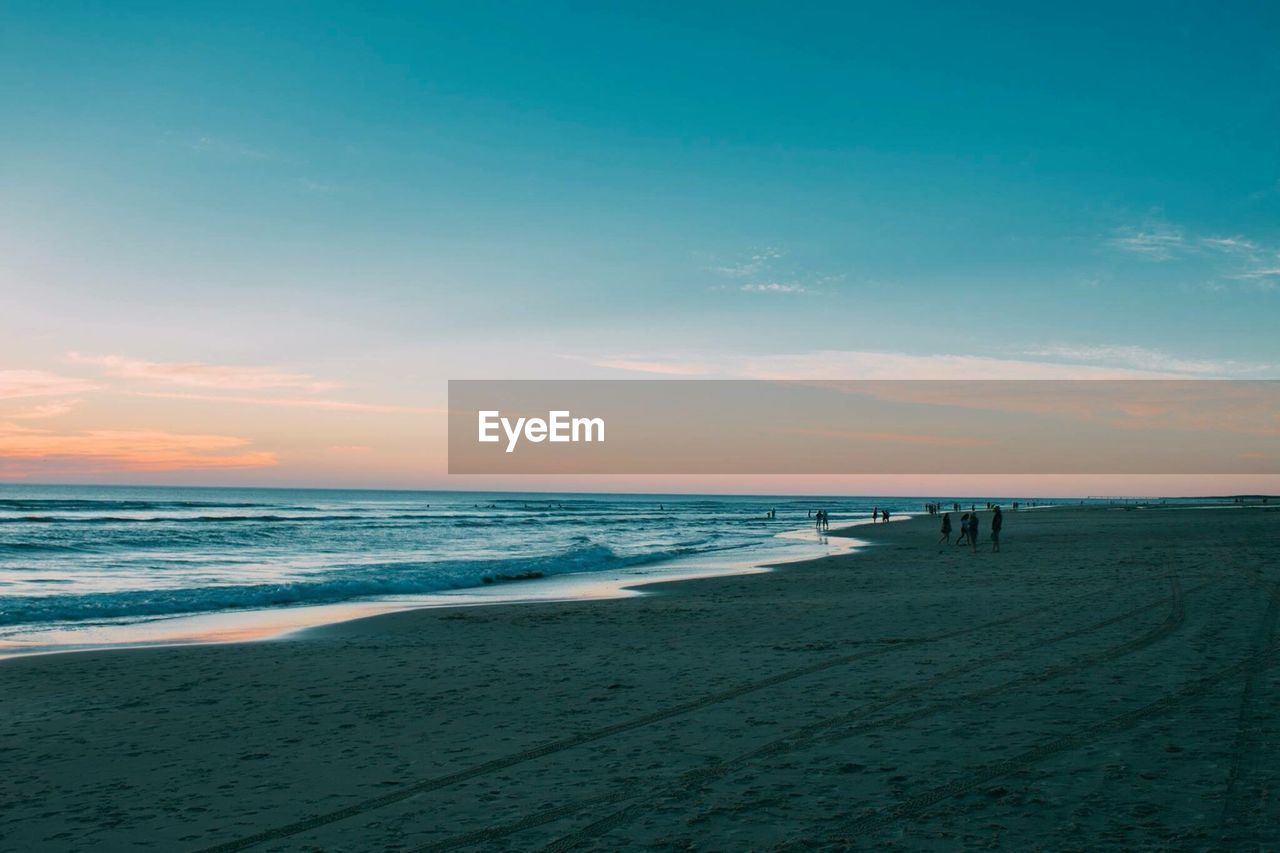 Scenic view of beach during sunset