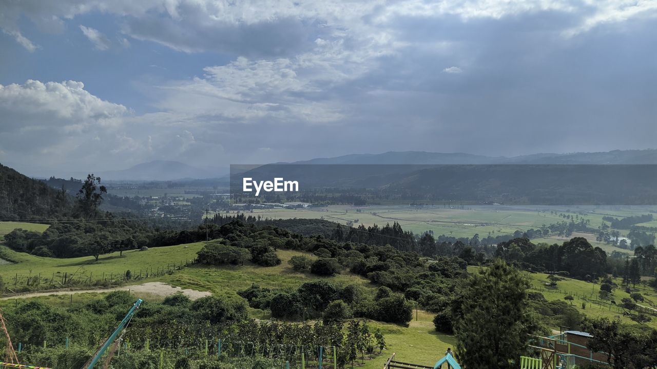 High angle view of trees on field against sky