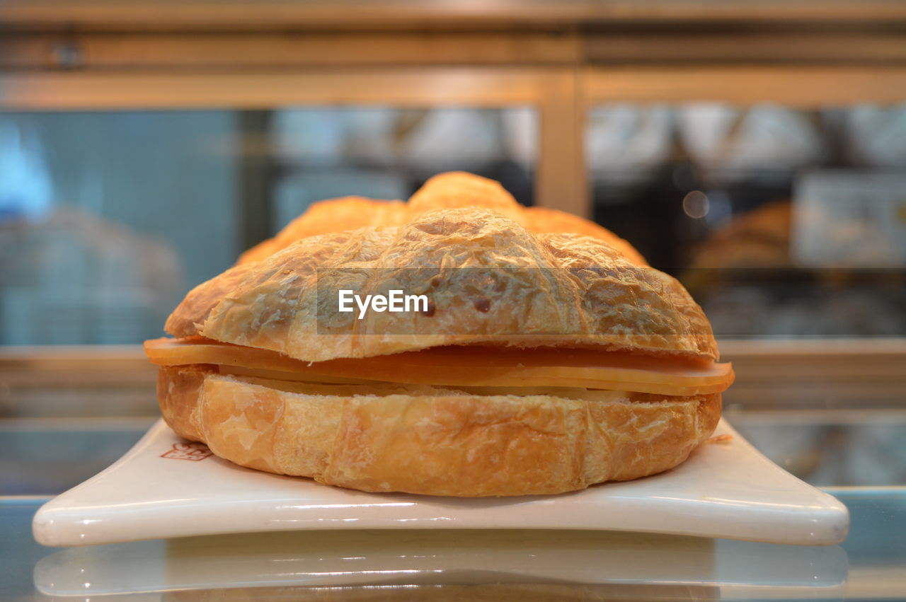 Close-up of sandwich served in plate on table