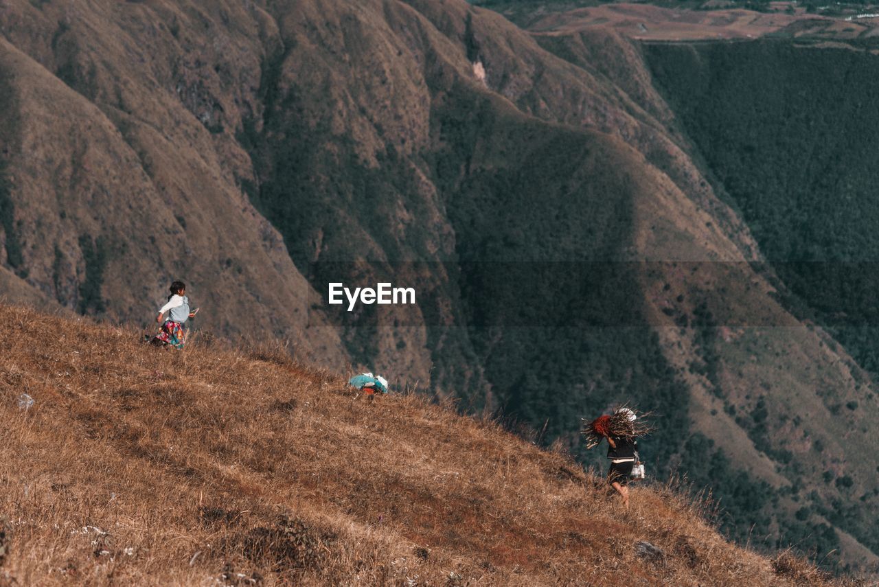 People walking on mountain