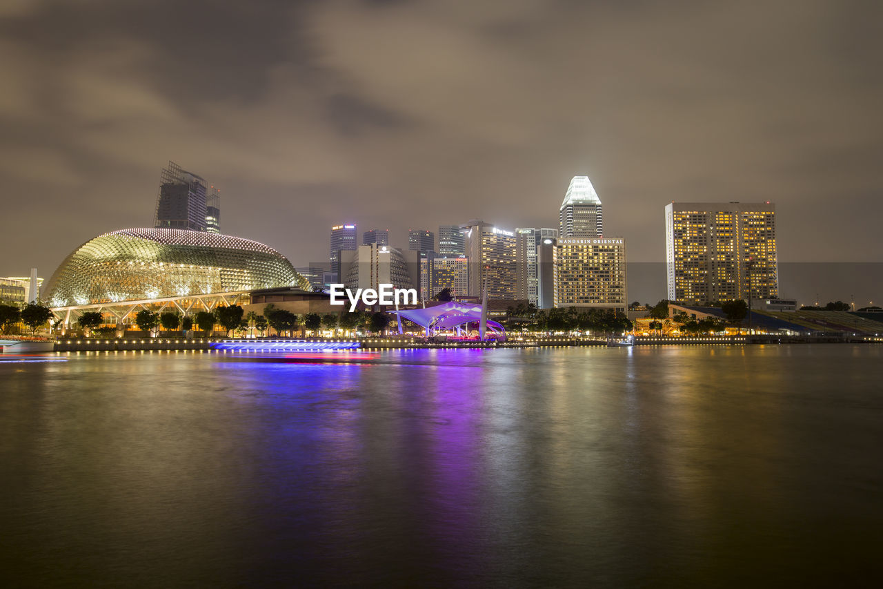 Illuminated city lit up at night