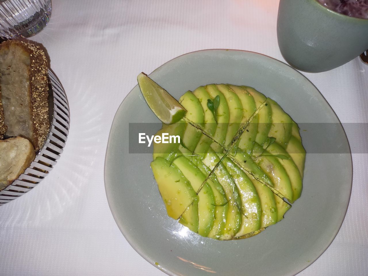 food and drink, food, healthy eating, plant, freshness, wellbeing, dish, produce, fruit, plate, slice, meal, table, indoors, vegetable, high angle view, no people, still life, breakfast, cuisine, serving size, tableware, directly above, fast food, citrus fruit