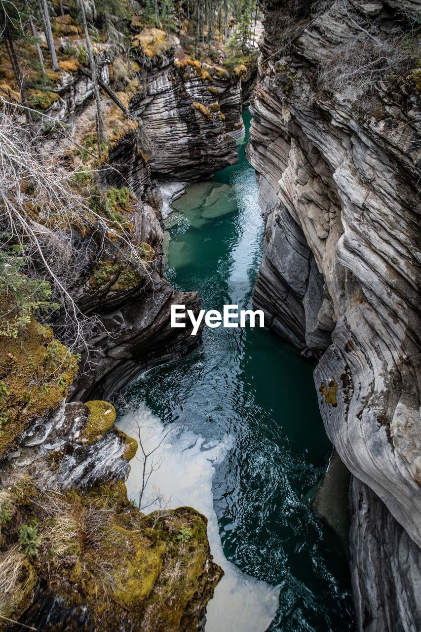 Aerial view of river amidst rock formations