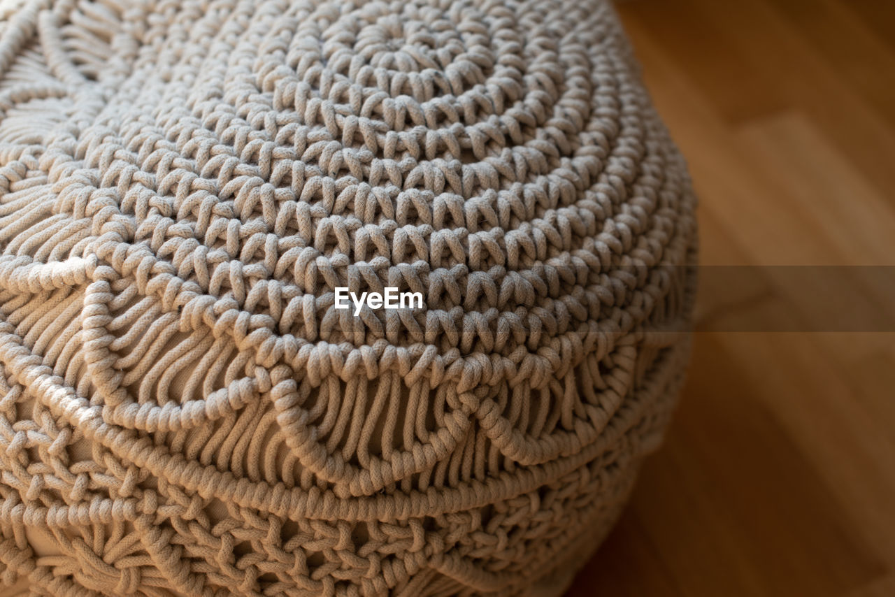 HIGH ANGLE VIEW OF OWL ON TABLE