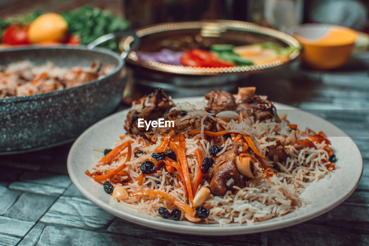 food, food and drink, dish, healthy eating, freshness, cuisine, wellbeing, plate, vegetable, no people, bowl, meal, spice, fruit, asian food, focus on foreground, crockery, table, meat, indoors, produce