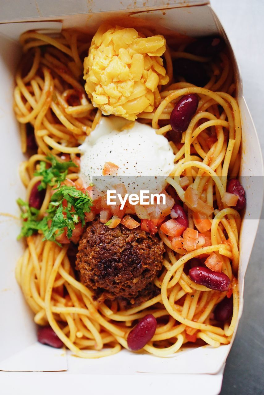 Close-up of noodles in box on table