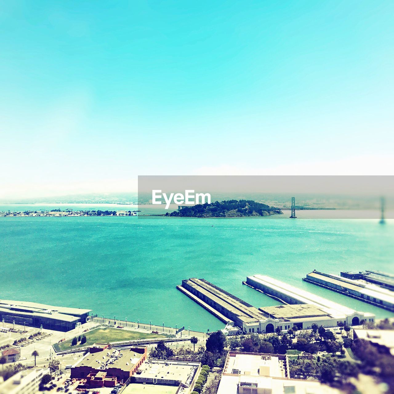 HIGH ANGLE VIEW OF CALM BLUE SEA AGAINST SKY