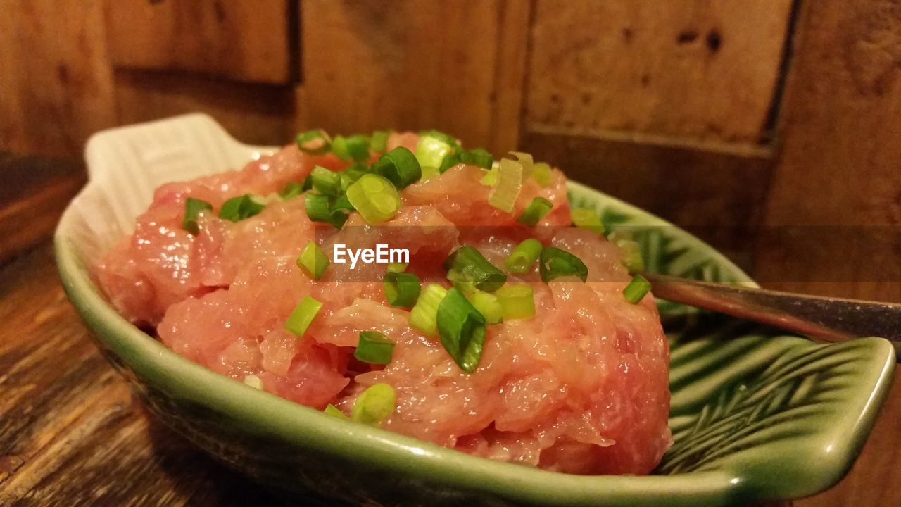 CLOSE-UP OF FOOD IN CONTAINER