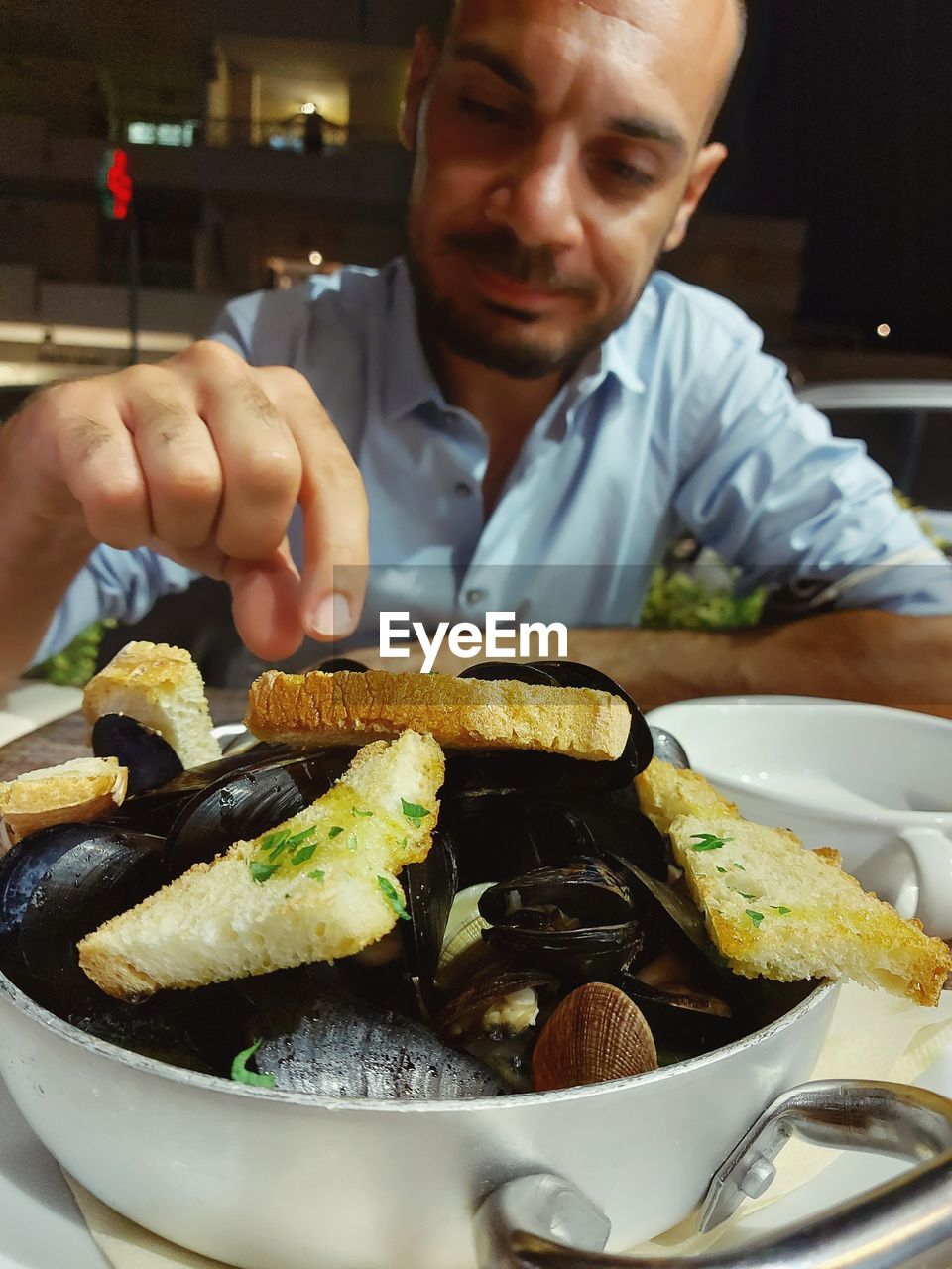 Man having food in restaurant