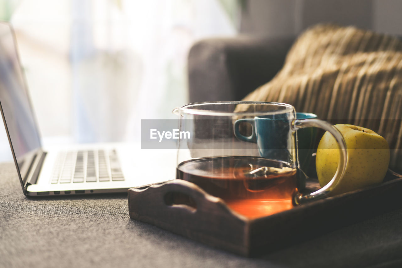 Close-up of coffee cup on table