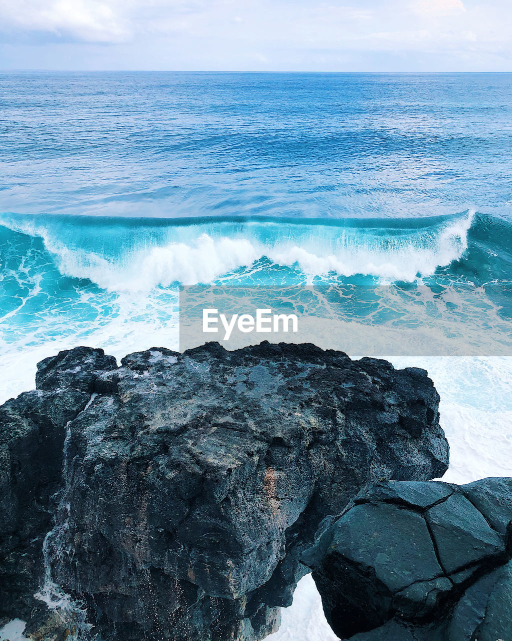 Scenic view of rocks in sea