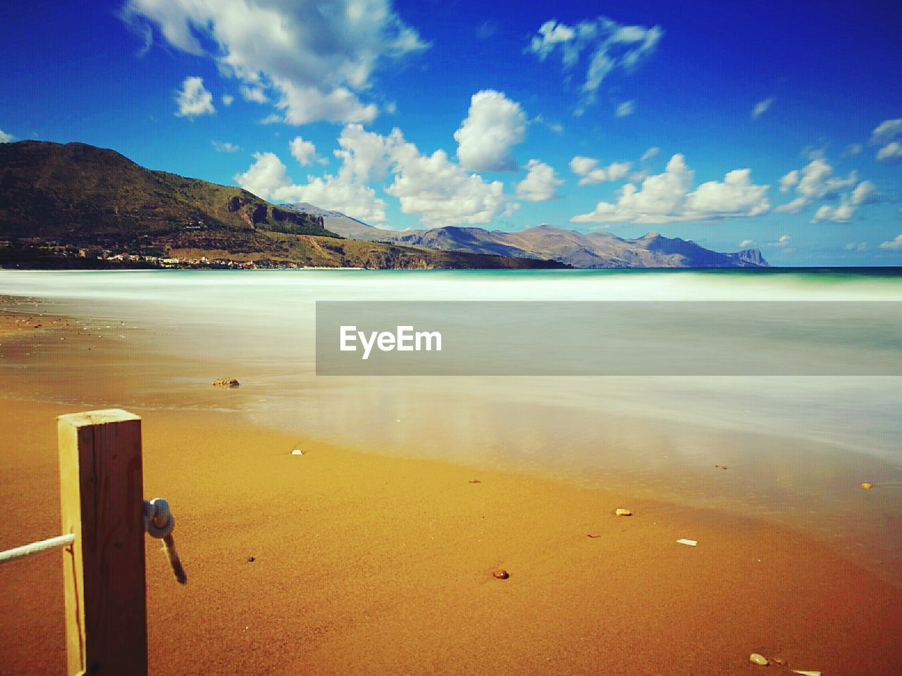 Scenic view of calm lake against mountains