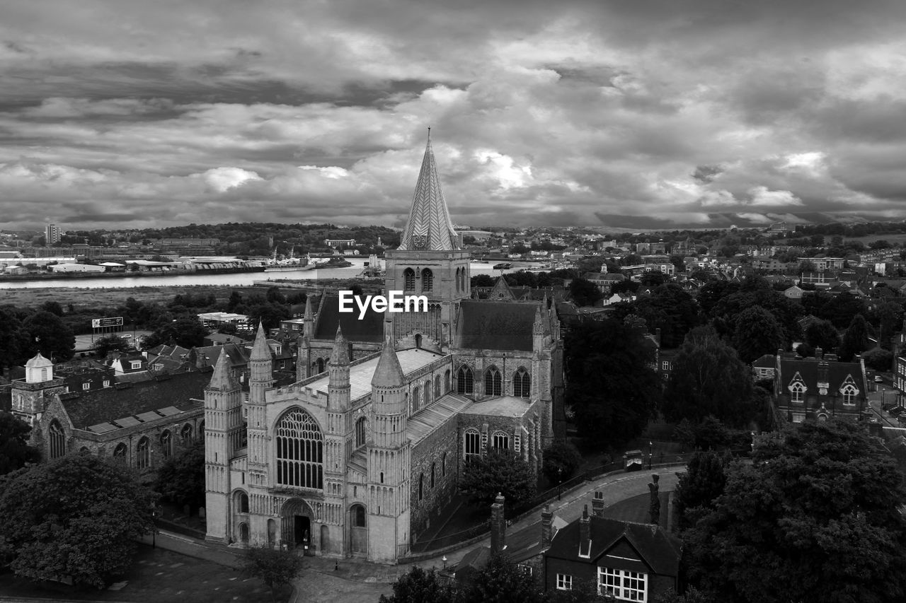 High angle view of rochester cathedral against cloudy sky