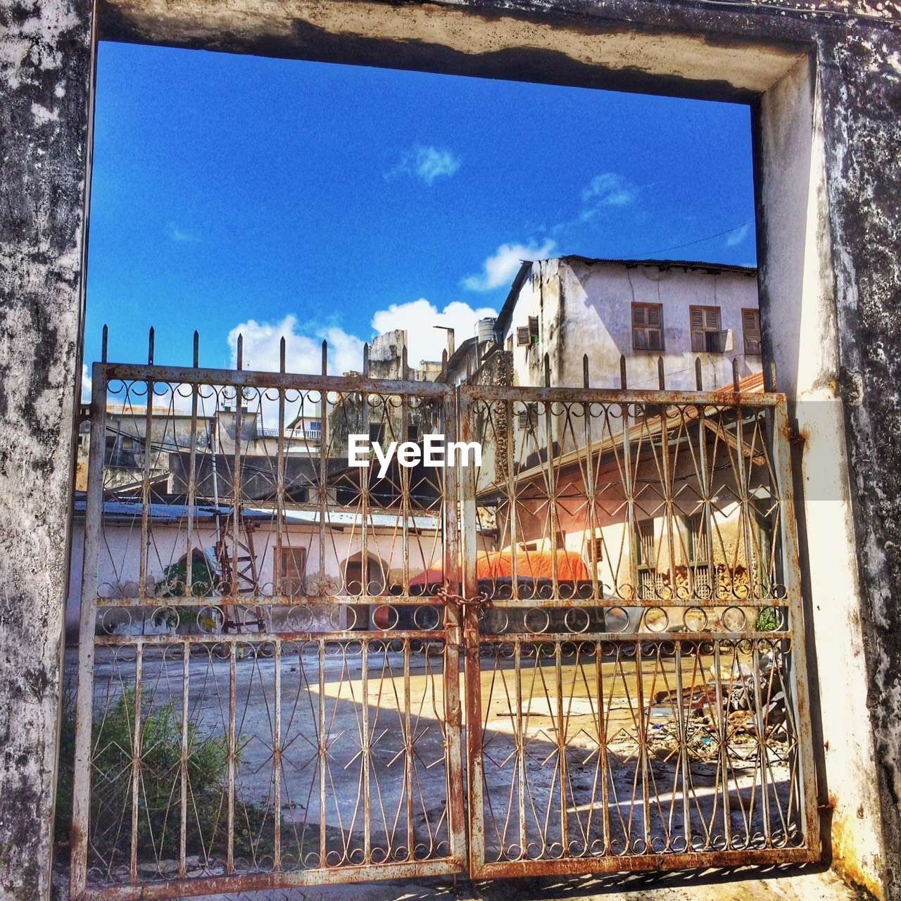 VIEW OF BUILT STRUCTURES AGAINST BLUE SKY