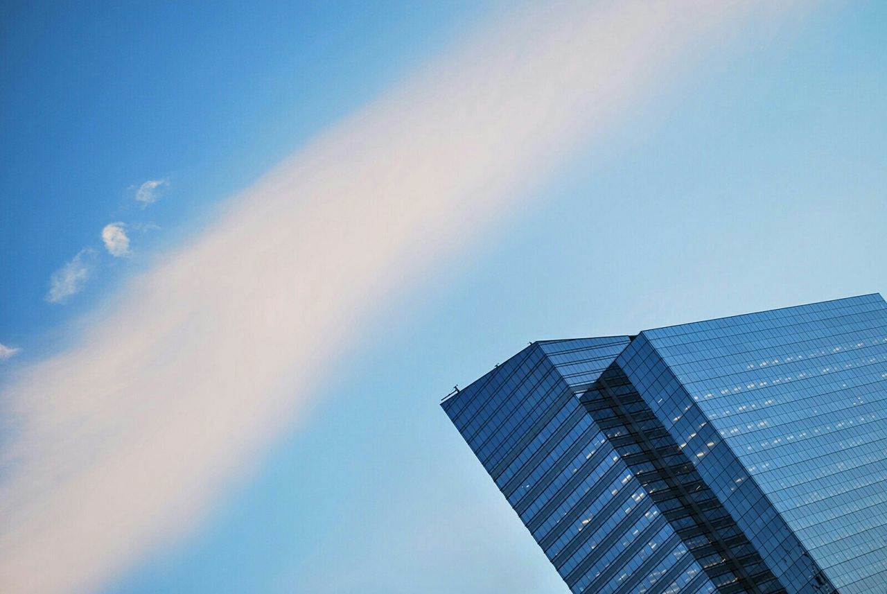 Low angle view of modern buildings against sky