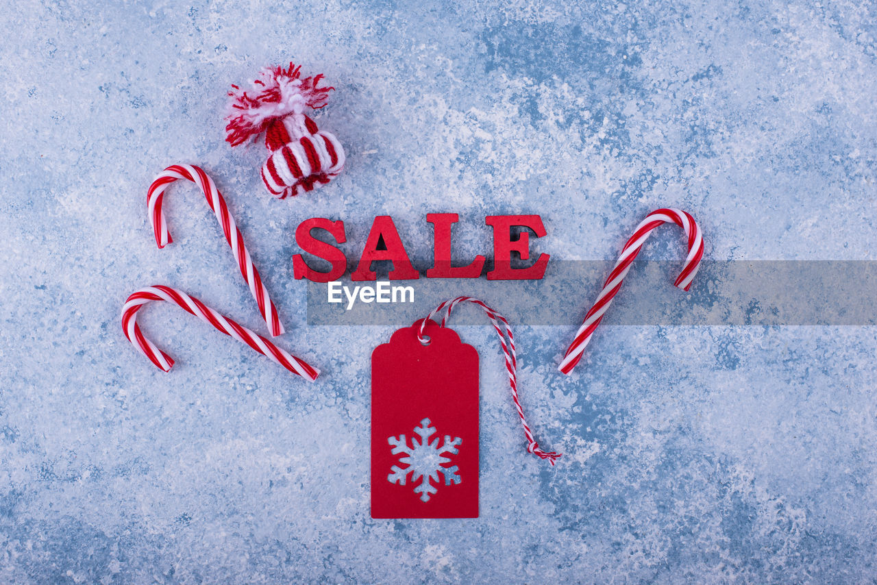 red, font, text, no people, communication, western script, positive emotion, emotion, celebration, heart shape, christmas, love, studio shot, blue, close-up, indoors, snow, high angle view, number, holiday