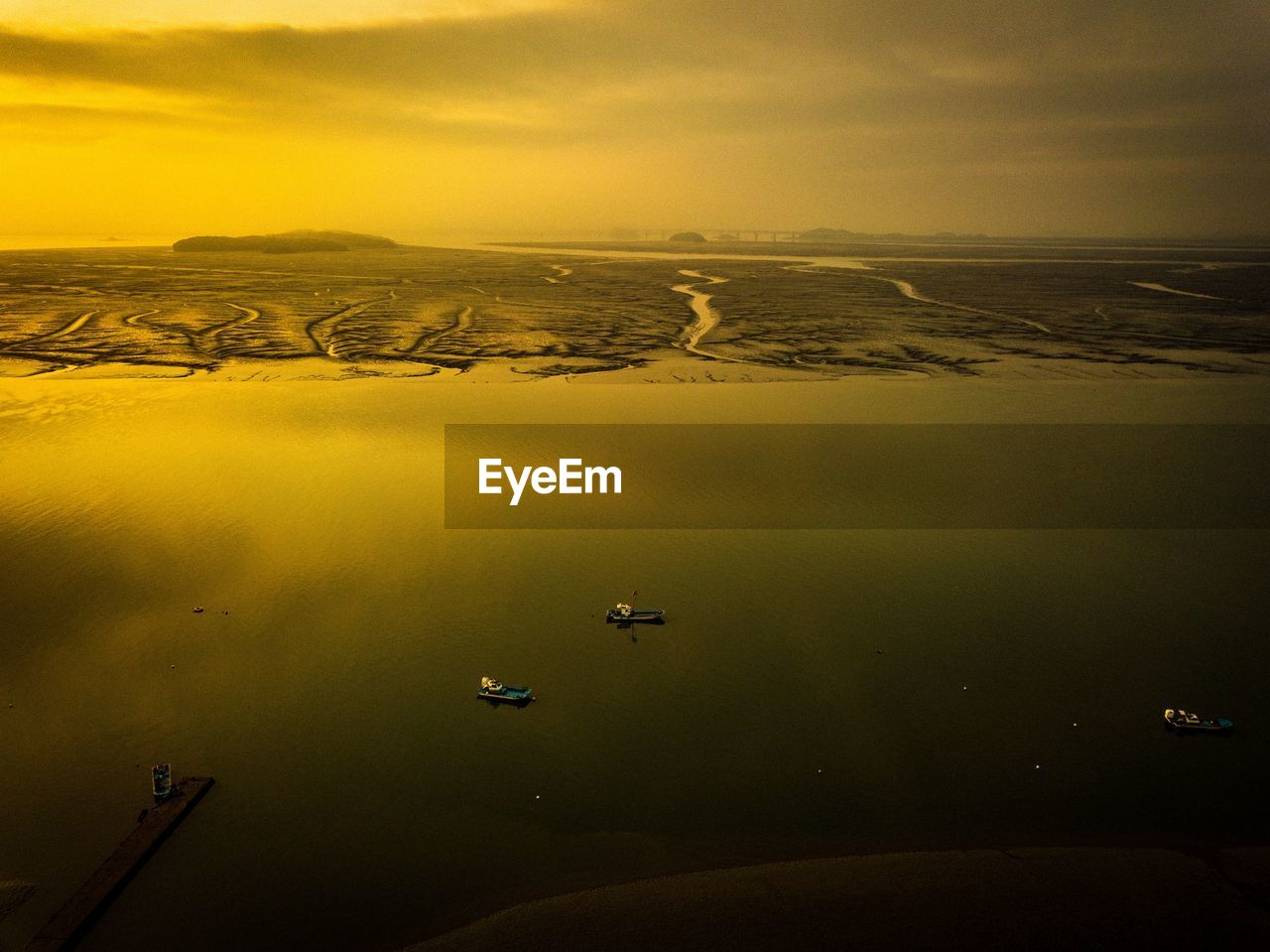 High angle view of sea against sky during sunset