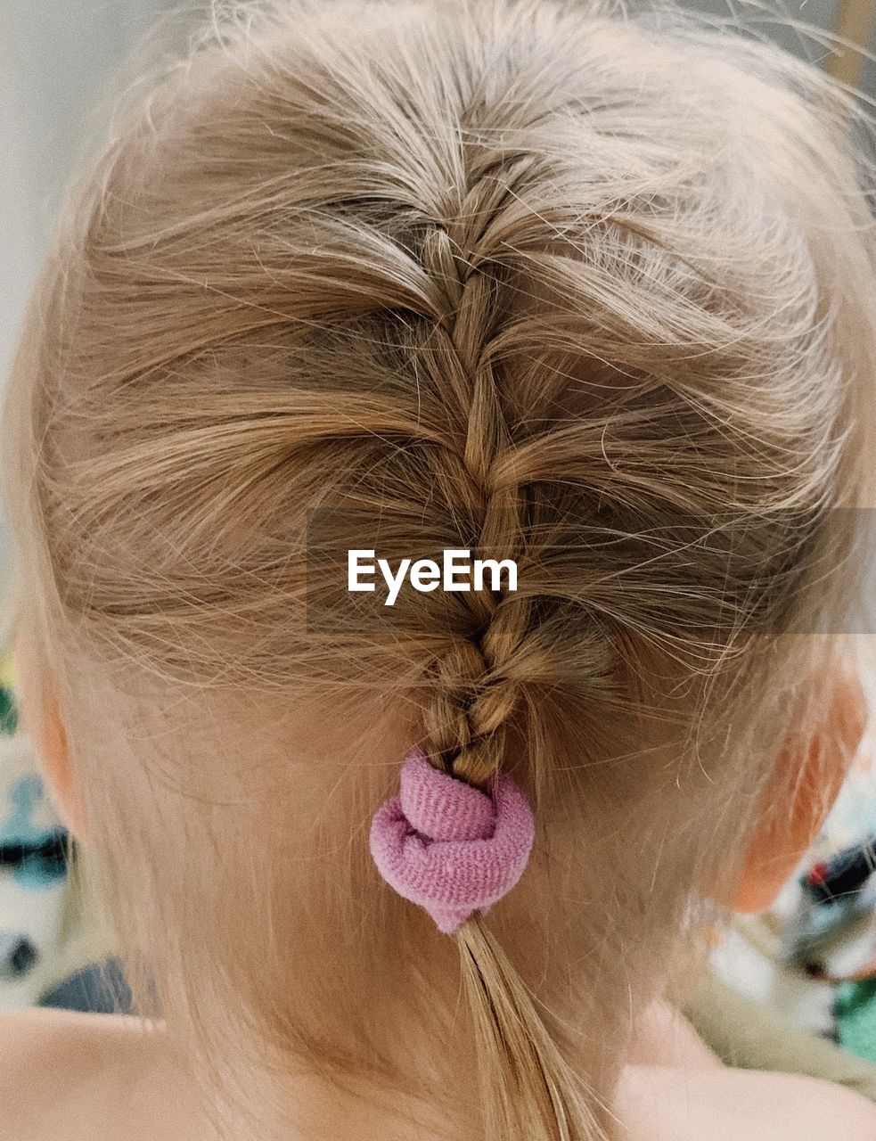Close-up of girl with blond hair