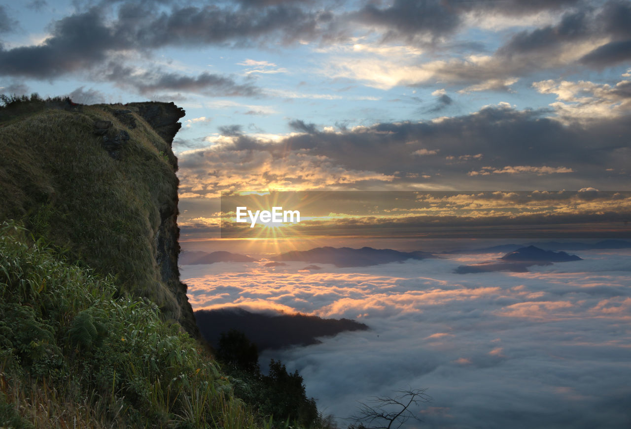 Scenic view of mountains against sky during sunset