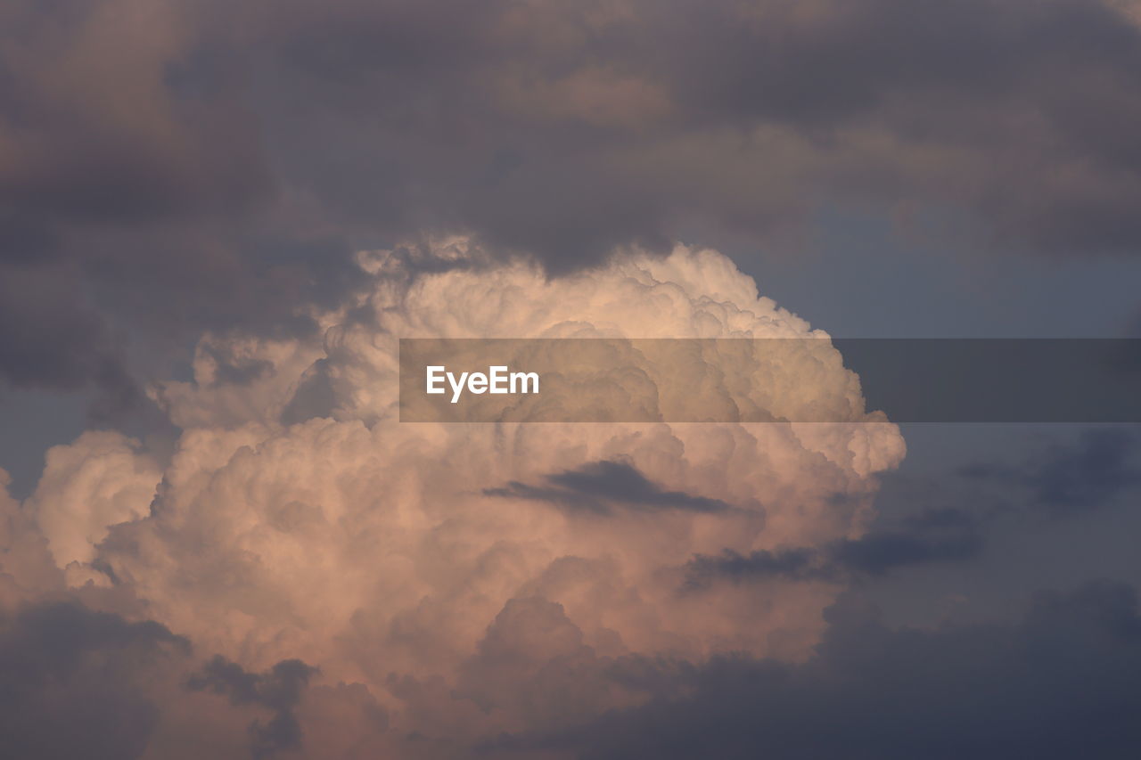 Close-up or front view of black and white clouds under the clear blue sky in rain season , clouds 