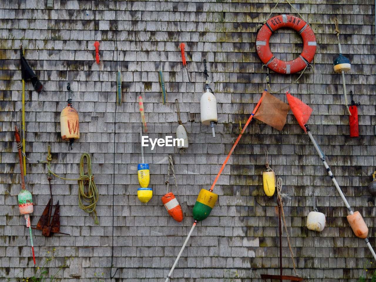 Buoys and life belt mounted on wall